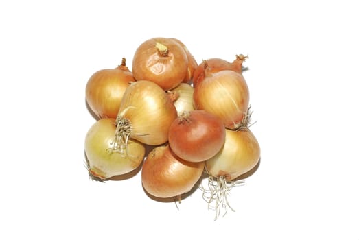 Heap of raw onion bulbs isolated on white background.
