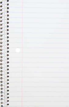 open spiral note book with lines