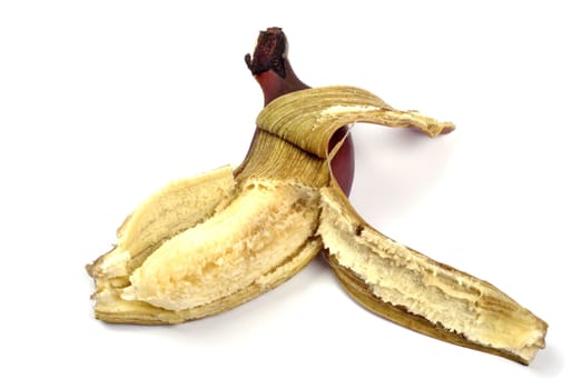 Peeled red banana close up isolated on white background.