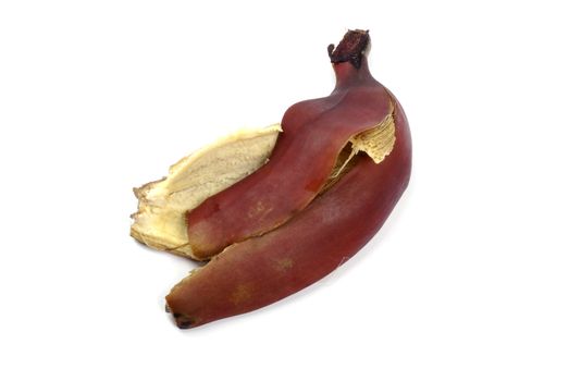 Red banana peel isolated on the white background.