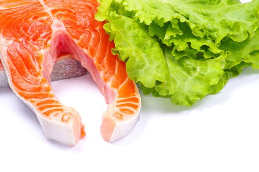 salmon and lettuce isolated on white background