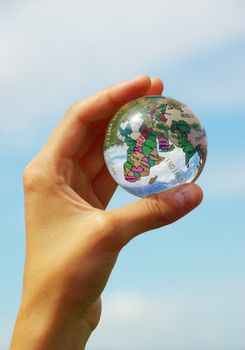 globe on the human hand