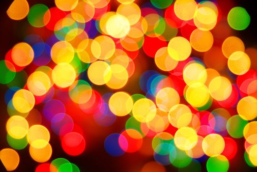 Abstract christmas lights as background on black