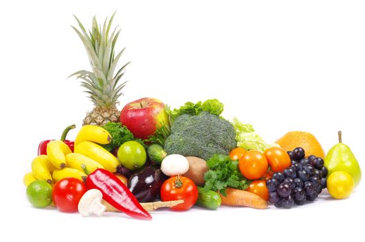 Fresh vegetables and fruits on white