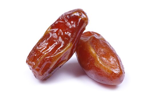 dryed dates on white background