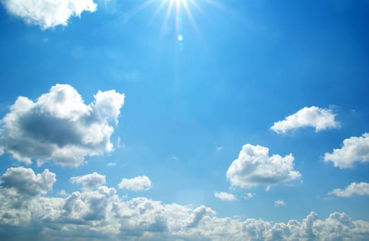 blue sky background with tiny clouds