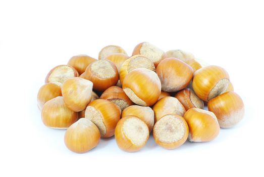 Much hazelnuts isolated on white     