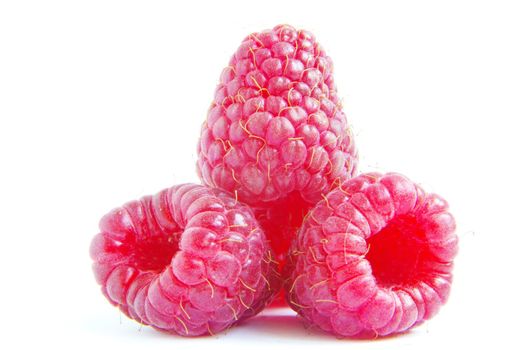 Ripe raspberry on a white background