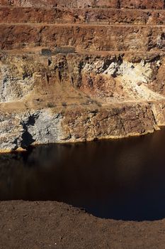 Detail of the São Domingos Mine, a deserted open-pit mine in Mertola, Alentejo, Portugal. This site is one of the volcanogenic massive sulfide ore deposits in the Iberian Pyrite Belt, which extends from the southern Portugal into Spain