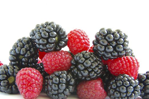  raspberry and blackberry on  white isolated background