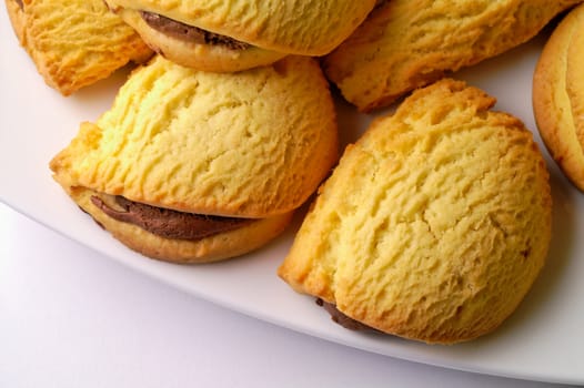 Chocolate filled pastries in a dish closeup