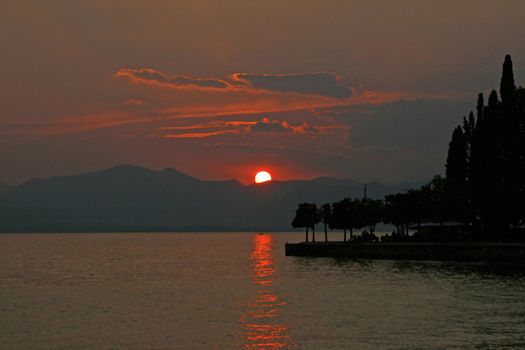 Evening tendency with Bardolino at the Lake if Garda.. Abendstimmung bei Bardelino.