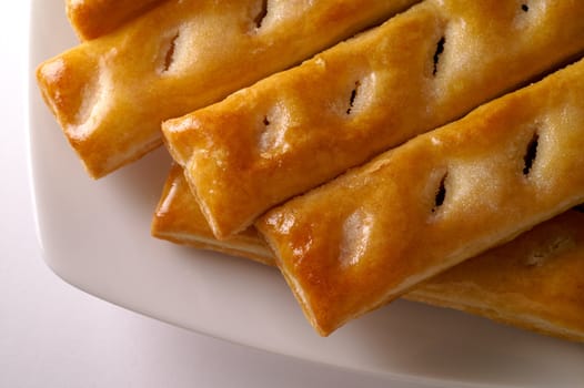 Glazed puff pastry in a dish  