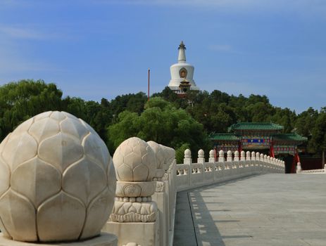 White pagoda in Beijing ancient park.