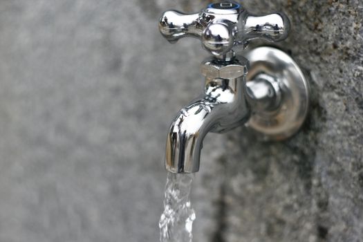 Water Faucets in a park with dripping water