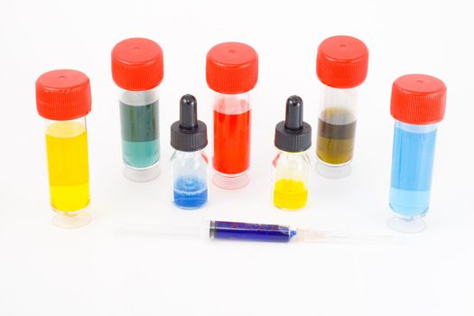 a set of five test tubes with colourful potions
