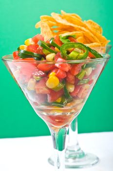 Homemade fresh salsa served with corn chips.