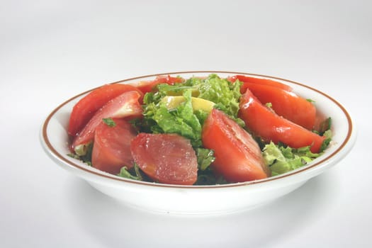 closeup salad with tomatoes and vegetables