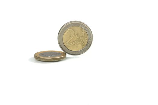 business concepts one and two euro coins isolated on total white