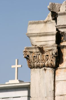 detail from Hadrian's Arch with christian cross background  landmarks in Athens greece