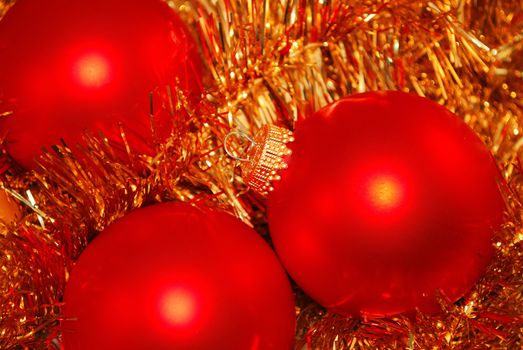 New Year red balls are on the gold ornament. 