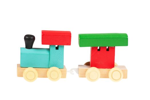Little wooden toy train isolated over white background