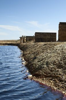 The São Domingos Mine is a deserted open-pit mine in Mertola, Alentejo, Portugal. This site is one of the volcanogenic massive sulfide ore deposits in the Iberian Pyrite Belt, which extends from the southern Portugal into Spain