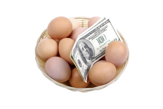 Eggs with dollars in basket isolated on white background. Financial concept.