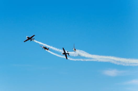 4 Acrobatic extra 300 multi cross on airshow