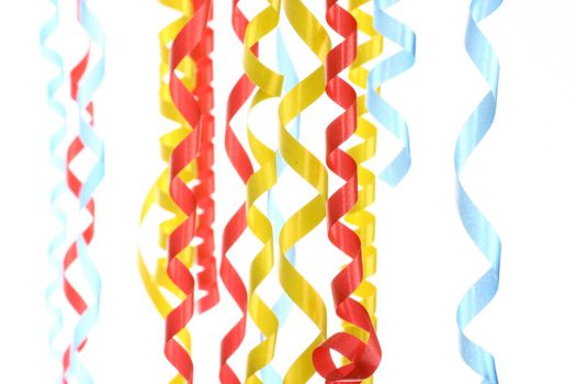Celebratory streamer of red green and yellow color on a white background (look similar images in my portfolio)