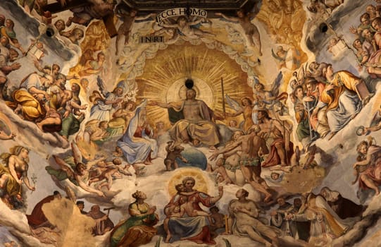 The Ceiling of the Duomo in Florence, Italy.  Featuring a fresco of Jesus, among others.
