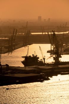 Aerial view of the Rotterdam port at Netherland - orange monochrome