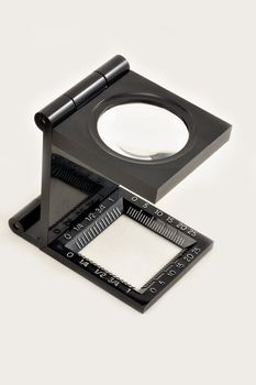 Isolated magnifying glass on white background.