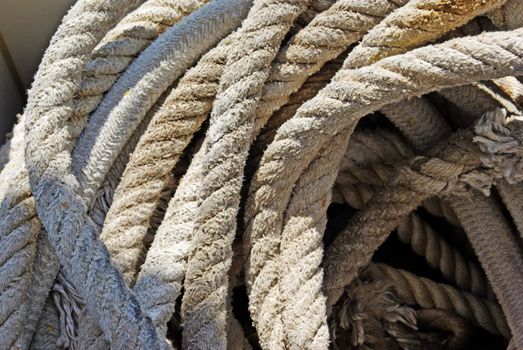 Rope with anchor on yacht for sailing as background.