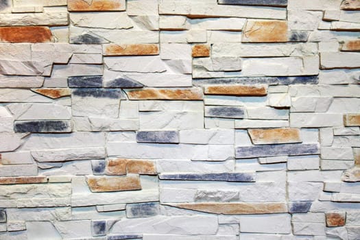 Interior wall decorated with stone as abstract background.