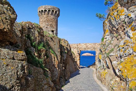 Fortess among rocks in Tossa de Mar. Costa Brava, Spain.