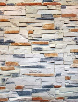 Interior wall decorated with stone as abstract background.