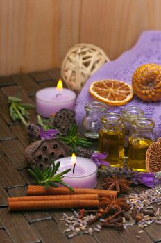 Spa concept with lavender, massage oil, aromatherapy items