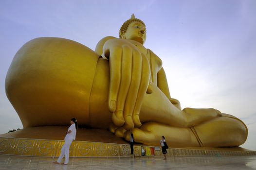 Big Buddha statue and blue sky in Thailand.