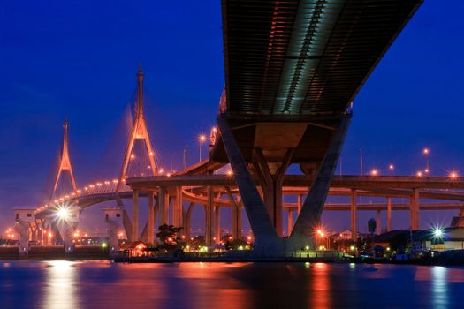 Bhumibol Bridge in Thailand, also known as the Industrial Ring  Bridge or Mega Bridge, in Thailand at dusk. The bridge crosses the Chao Phraya River twice.