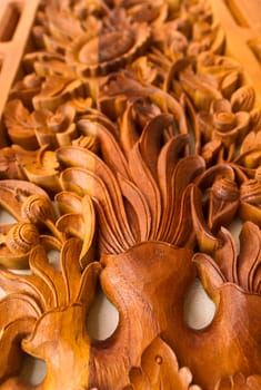 wood art panel hanged on the pillar of a modern house as an interior decoration