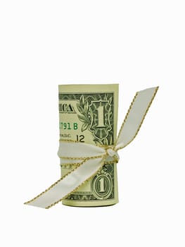 A single US Banknote rolled and tied with a white ribbon.