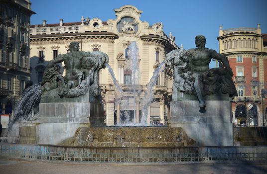 Fountain and statues in Solferino Square in Torino, Italy (daytime)