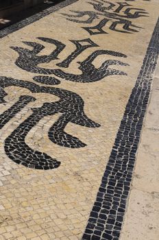 Portugal. Lisbon. Typical portuguese cobblestone hand-made pavement 
