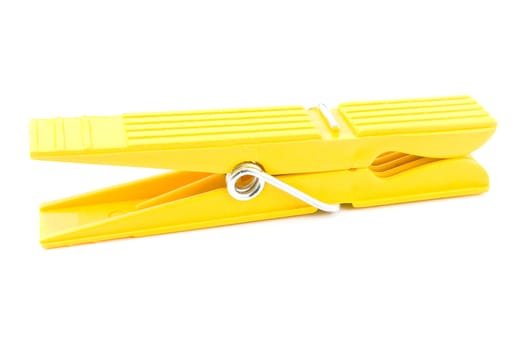 Yellow Clothespin isolated on white