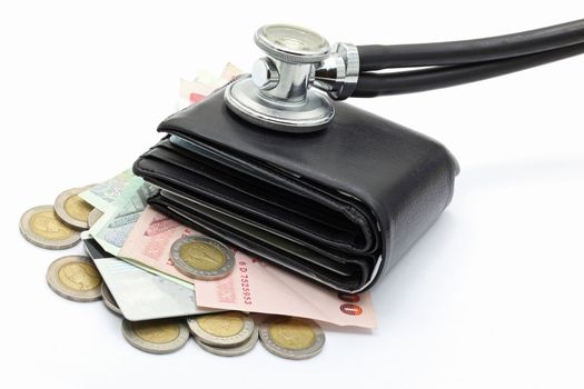 diagnose finance situation with stethoscope and cash wallet