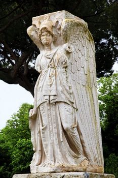 Ancient Roman Angel Statue Ostia Antica Ruins Rome Italy
Excavation of Ostia, ancient Roman port, next to airport.  Was port for Rome until 5th Century AD.
