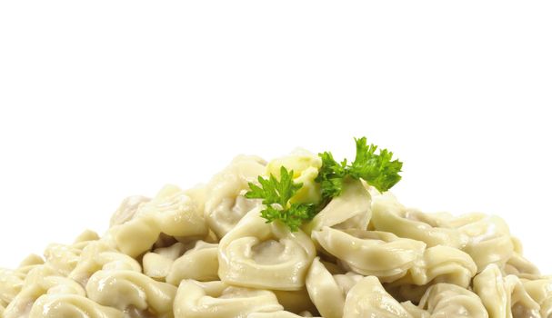 Bowl with traditional russian dish - pelmeni on the white