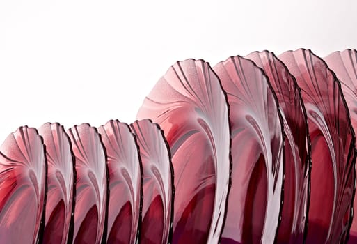 red glass dishes isolated on white background