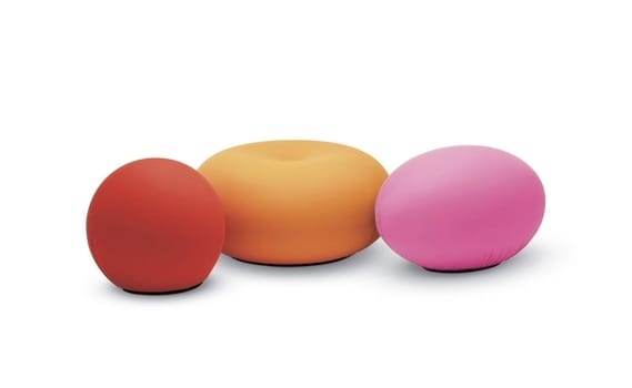three colored puffs on a white background
